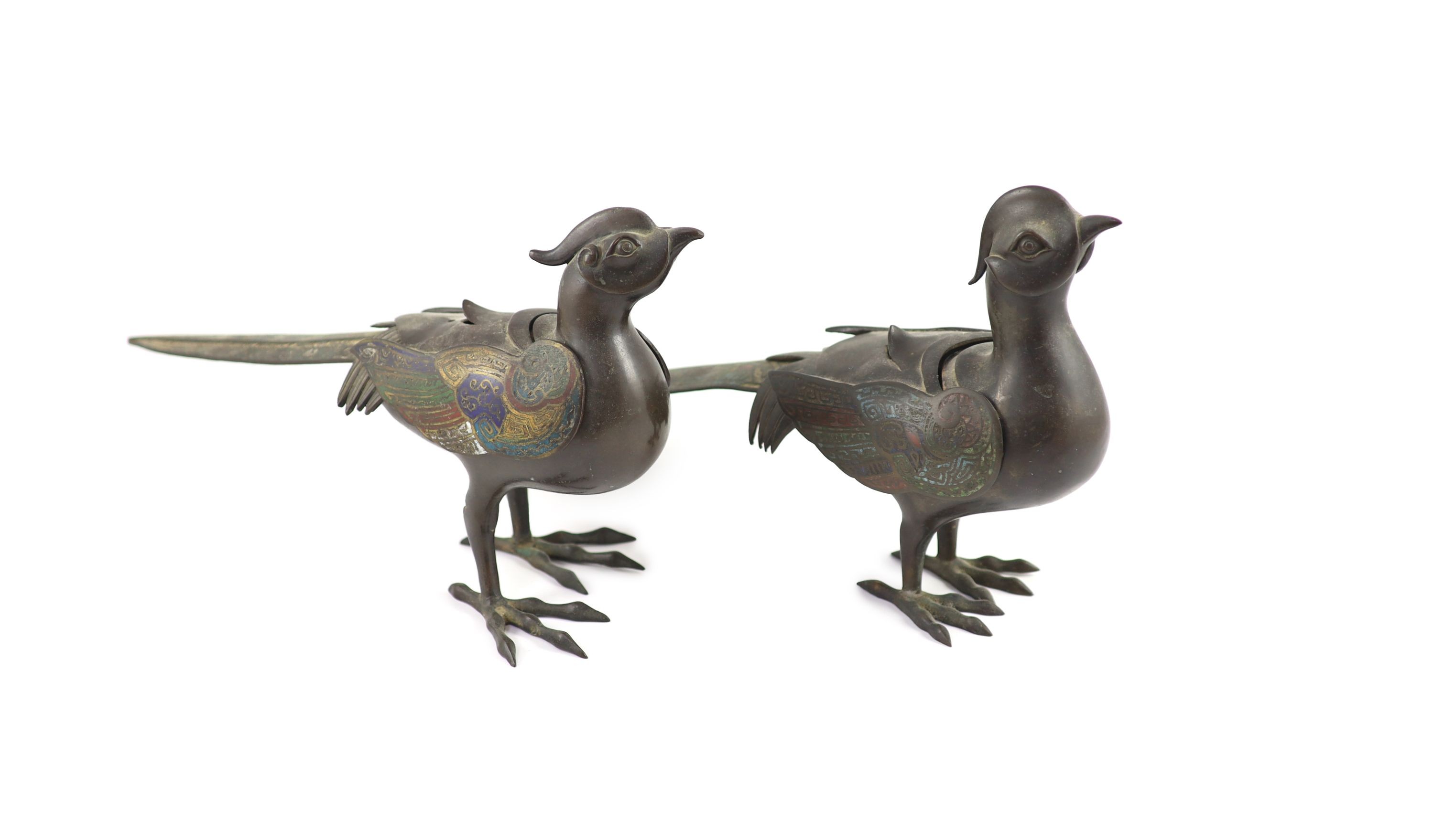 Two similar Japanese champlevé enamel and bronze ‘pheasant’ censers and covers, Meiji period, 39 cm long